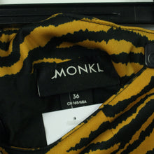 Laden Sie das Bild in den Galerie-Viewer, Second Hand MONKI Rock Gr. 36 orange schwarz Animal-Print Minirock (*)